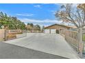 Spacious driveway with double gate entrance at 7390 W Rome Blvd, Las Vegas, NV 89131
