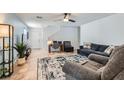 Bright living room featuring a cozy sitting area at 9961 Mardagen St, Las Vegas, NV 89183