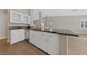 Spacious kitchen with granite countertops and stainless steel appliances at 1009 Beaver Crest Ter, Henderson, NV 89015