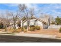 Three-car garage and a long driveway at 1010 Legacy Dr, Boulder City, NV 89005