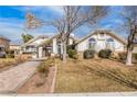 Landscaped yard and a large inviting entryway at 1010 Legacy Dr, Boulder City, NV 89005