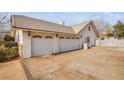 Three-car garage with attached carport at 1010 Legacy Dr, Boulder City, NV 89005