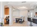 Light and bright dining area with seating for six at 237 Garrett Ln # 2, Boulder City, NV 89005