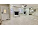 Living room features a fireplace and mirrored wall at 2631 Aracatuba Ave, Las Vegas, NV 89121