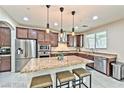 Spacious kitchen with stainless steel appliances and granite countertops at 2934 Tremont Ave, Henderson, NV 89052