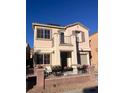 Two-story house with balcony, landscaped yard, and attached garage at 3679 Wild Springs St, Las Vegas, NV 89129