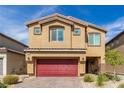 Tan two-story house with red garage door and front yard landscaping at 4036 Floating Fern Ave, North Las Vegas, NV 89084