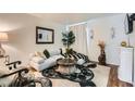 Cozy living room with a comfy sectional sofa and stylish rug at 526 Sellers Pl, Henderson, NV 89011