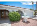 Charming home exterior with manicured lawn and a decorative fountain at 5515 Coley Ave, Las Vegas, NV 89146