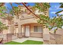 Inviting front entrance showcasing a cozy porch and well-maintained landscaping at 10424 Wyatt Earp Ct, Las Vegas, NV 89129