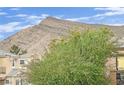 Scenic view of a majestic mountain range with blue sky, seen from the home at 10424 Wyatt Earp Ct, Las Vegas, NV 89129