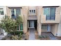 Modern townhome community with lush landscaping at 11287 Idyllic Dr # 102, Las Vegas, NV 89135