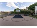 Private outdoor basketball court with a regulation hoop at 12 Bloomfield Hills Dr, Henderson, NV 89052