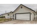 Attached garage with a new door and fresh coat of paint at 1947 Balboa Ave, Las Vegas, NV 89169