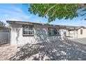 Updated home with paved front yard and mature shade tree at 209 N 21St St, Las Vegas, NV 89101