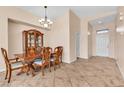 Elegant dining room featuring a formal table and hutch at 3041 Bublin Bay Ave, North Las Vegas, NV 89081