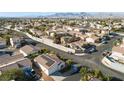 Community overview showcasing numerous houses and surrounding landscape at 7909 Dutch Canyon Ct, Las Vegas, NV 89131