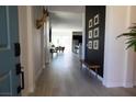 Bright and spacious entryway with wood-look flooring and views into the living area at 862 Silverton Springs St, Henderson, NV 89011