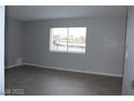 Spacious bedroom with grey walls and tile floors at 1420 Vegas Valley Dr # 23, Las Vegas, NV 89169