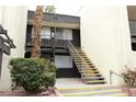 Exterior view of a building with a staircase leading to the entrance at 1420 Vegas Valley Dr # 23, Las Vegas, NV 89169