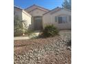 One-story house with a front yard and walkway at 5916 W Sunrise Creek, North Las Vegas, NV 89031