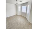 Bright dining area with tile flooring and bay window at 6104 Daisy Lee Ave, Las Vegas, NV 89108