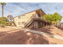 Apartment building with stairs and fence at 625 S Royal Crest Cir # 23, Las Vegas, NV 89169
