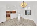 Dining area with hardwood floors and kitchen access at 8725 W Flamingo Rd # 110, Las Vegas, NV 89147
