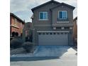 Two-story house with attached garage and landscaping at 9217 Placer Bullion Ave, Las Vegas, NV 89178