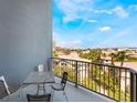 Relaxing balcony view with patio furniture and a pleasant cityscape at 211 E Flamingo Rd # 412, Las Vegas, NV 89169