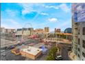 Vibrant city view showcasing the Ferris Wheel and skyline, seen from a high-rise window at 211 E Flamingo Rd # 412, Las Vegas, NV 89169