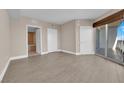 Spacious bedroom with wood-look floors and en-suite bathroom access at 322 Karen Ave # 1903, Las Vegas, NV 89109