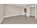 Bedroom with wood-look floors and bathroom and closet access at 322 Karen Ave # 1903, Las Vegas, NV 89109