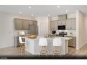 Modern kitchen with an island and stainless steel appliances at 340 Talladega Ct # Lot 13, Henderson, NV 89015