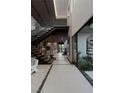 Grand entry with modern staircase and courtyard views at 3530 Cosima Ln, Las Vegas, NV 89120