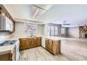 Spacious kitchen featuring wood cabinets and modern appliances at 3954 Edgemoor Way, Las Vegas, NV 89121