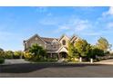 Stunning two-story home with brick facade and beautiful landscaping at 4386 Jerdon Ct, Las Vegas, NV 89129