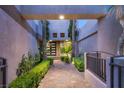 Elegant entryway with a paved pathway and lush landscaping at 9113 Golden Eagle Dr, Las Vegas, NV 89134