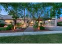 Single-story house with a landscaped yard and attached garage at 9113 Golden Eagle Dr, Las Vegas, NV 89134