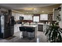 Modern kitchen featuring white cabinets, a large island, and stainless steel appliances at 2109 Juana Vista St, Las Vegas, NV 89102