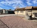 Backyard with gravel landscaping and well at 2528 Flower Ave, North Las Vegas, NV 89030