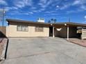 House exterior with carport and driveway at 2528 Flower Ave, North Las Vegas, NV 89030