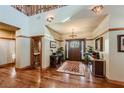 Grand entryway with hardwood floors and high ceilings at 5895 S Gateway Rd, Las Vegas, NV 89120