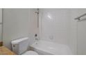 Clean bathroom with shower/tub combo, tile surround, and white fixtures at 8600 W Charleston Blvd # 1034, Las Vegas, NV 89117