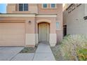 Close up of the front of the house, showing the covered front door at 8889 W Torino Ave, Las Vegas, NV 89148