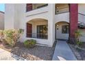 Front entrance of the building with walkway and landscaping at 950 Seven Hills Dr # 1512, Henderson, NV 89052