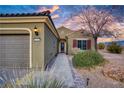 Front entry and walkway of a charming single-story home at 1460 Tannery Hts, Mesquite, NV 89034