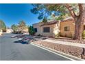 View of the house from the street, showing a walkway and landscaping at 2851 S Valley View Blvd # 1172, Las Vegas, NV 89102