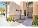 Inviting entryway with stone accents and landscaping at 3555 Meridale Dr # 1145, Las Vegas, NV 89147