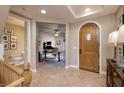 Interior hallway with access to an office and bathroom at 38 Strada Principale, Henderson, NV 89011